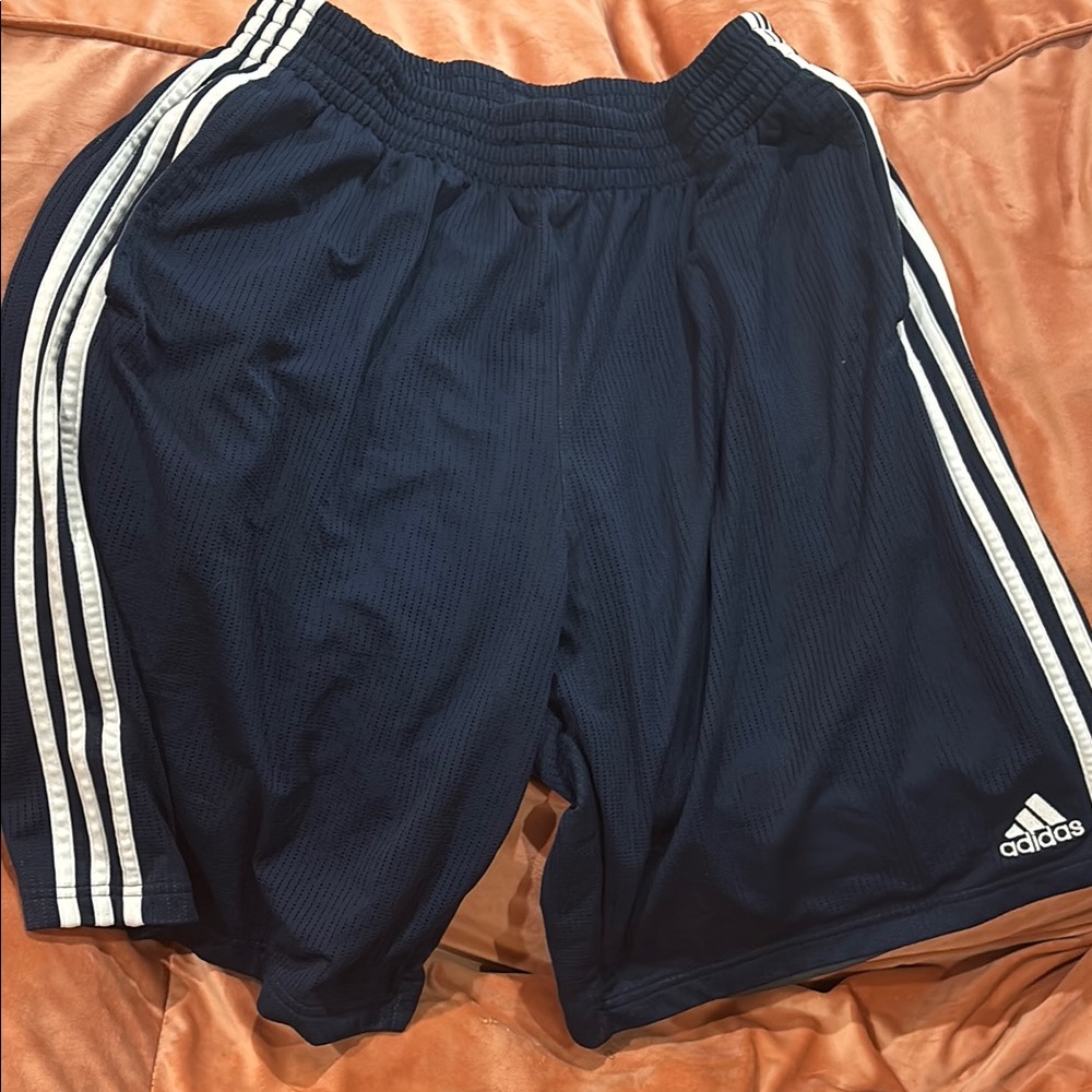 Adidas Blue Athletic Shorts with Iconic Stripes